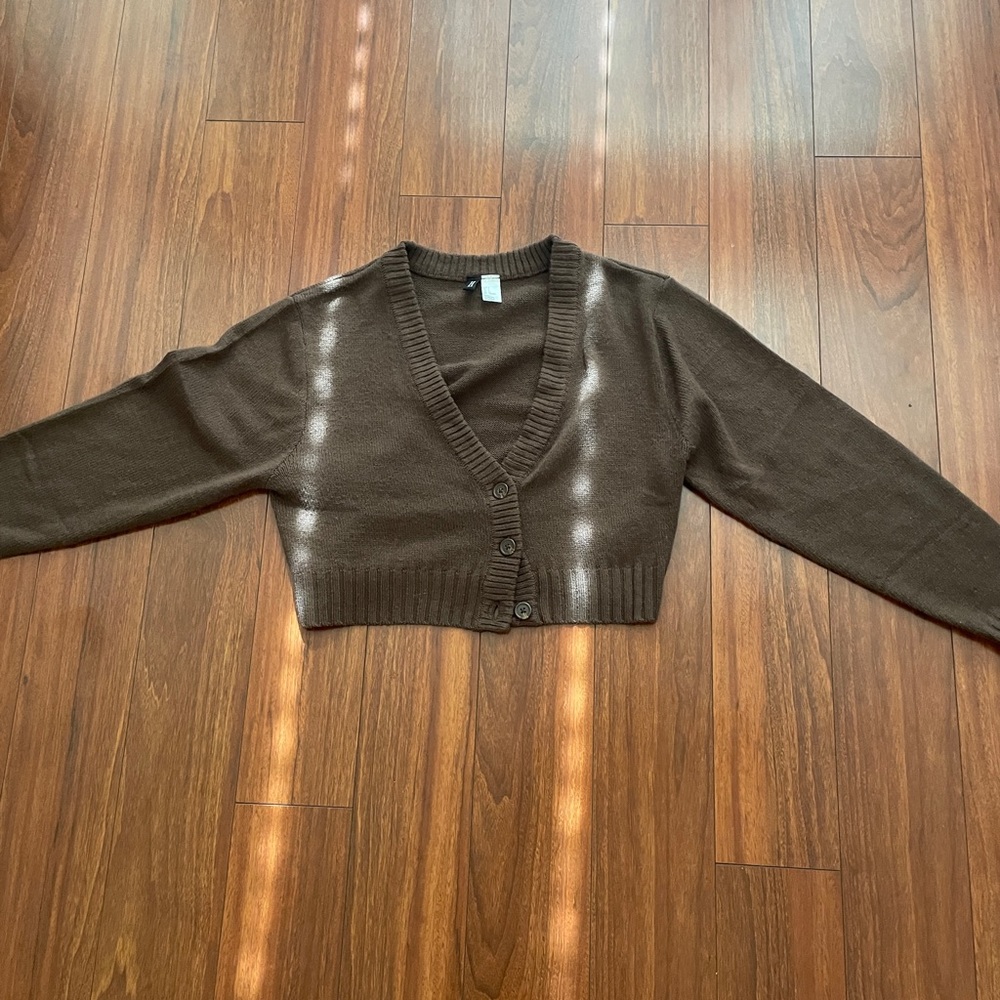 Woman’s H&M cropped brown knit cardigan size small.